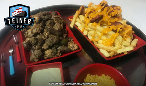 O Pub da Faculdade! Porção de carne, coração e frango + porção de batata frita no Teiner Pub, válido de terça a sábado