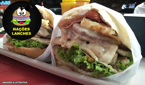 Escolha entre: X-Galinha, X-Egg, X-Calabresa, X-Burguer, X-Bacon, X-Pepino, X-Bauru ou X-Dog no Nações Lanches válido de segunda a segunda para consumo no local, retirada ou tele-entrega*