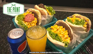 Deliciosamente irresistível! X-salada + refrigerante ou suco natural no The Point Restaurante e Lanchonete, válido de segunda a sexta para consumo no local