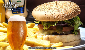 Hambúrger artesanal com 200g de carne de costela com batatas rústicas + chopp pilsen 300ml ou refrigerante lata no All Stars Sports Bar, válido de terça a sábado para consumo no local