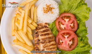 Balneário Gaivota - SC! À la minuta de frango, peixe ou carne com acompanhamentos + suco de limão no Boteco da Praia Petiscaria, válido de segunda a segunda